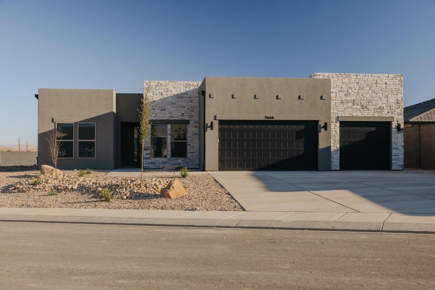 Discover comfort, quality, and move-in-ready convenience in this spacious single-story, 4-bedroom, 2.5-bath home on a desirable corner lot with beautiful views. The flexible fourth room can serve as a bedroom, office, or bonus space to fit your lifestyle. Enjoy premium finishes throughout, including quartz countertops, soft-close cabinets, a cozy fireplace, and a 3-car extra-wide finished garage. Built with durability and efficiency in mind, the home features 2x6 construction, R50 ceiling insulation, and R19 wall insulation. Residents also enjoy access to a private community pool and bath house. Located in the sought-after Divario community, this home offers both quality craftsmanship and everyday comfort in an exceptional setting.