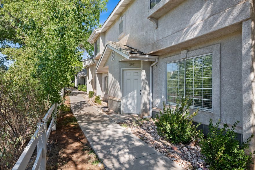 Great investment property or home. Clean and move-in ready. Two covered carports included and a fenced in patio. Close to shopping, trails, and more. A must see!