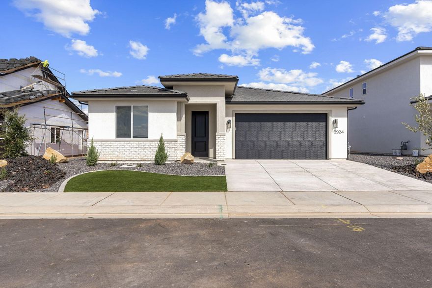 MOVE IN READY!! This beautiful 3-bedroom, 2-bathroom home is in the scenic Sand Hollow area offers the perfect opportunity to own a thoughtfully designed residence by Holmes Homes. With modern finishes, open-concept living, and a 2 car garage, this home is ideal for full-time living, a second home, or a low-maintenance desert retreat. Located in the Legacy at Sand Hollow community near Sand Hollow Reservoir, sand dunes, and award- winning golf, enjoy the best of Southern Utah's outdoor lifestyleâ€”built just for you. Home will be completed beginning of October! Contact me for a private showing.