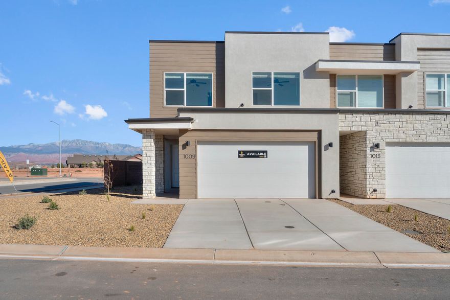 This inviting 3 bedroom, 2.5 bathroom townhome boasts a prime location just moments away from Zion Shores surf park, Warner Valley, and Sand Hollow making it perfect for outdoor enthusiasts and adventure seekers. The spacious living area flows seamlessly into a well-appointed kitchen complete with stainless steel appliances. The generous primary bedroom is complete with an en-suite and walk in closet. Two additional bedrooms provide plenty of space for guests, a home office, or hobbies and they share a stylishly designed full bathroom. A convenient half-bath is located on the main level. Step outside to enjoy your own covered patio where you can enjoy views of Warner Valley and Pine Valley.