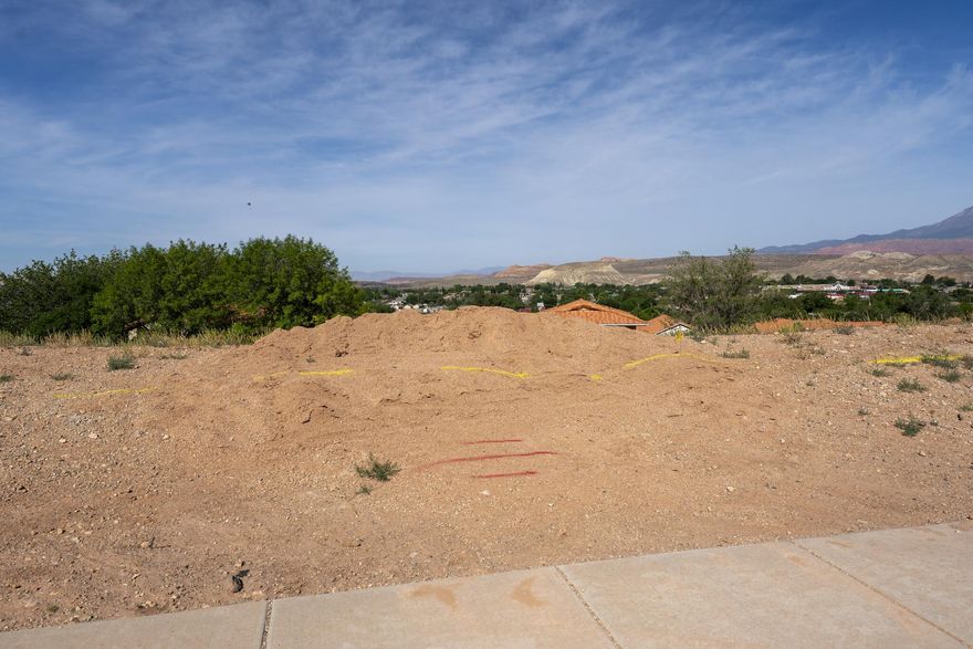 Conveniently located in La Verkin just minutes from Zion National Park, this .23 acre lot has walk-out basement potential. Providing the perfect opportunity to build in Southern Utah without the burden of HOA fees, this affordable building lot has a lot to offer. Tucked into a relaxed neighborhood, you will enjoy sweeping views of the valley and surrounding red rock mesas without paying premium resort prices.