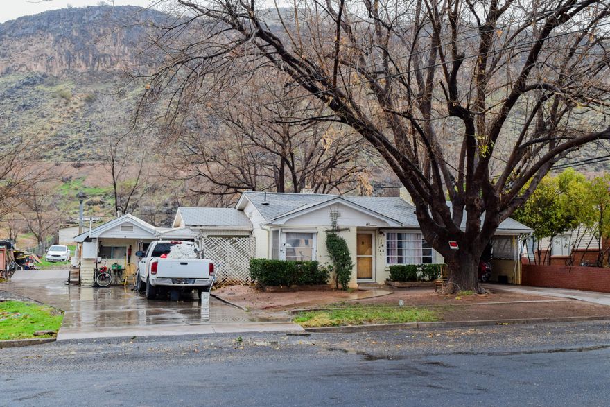 Nice horse property nestled up to the mountain
needs up dating has a back entrance to the property for  easy access with a trailer.