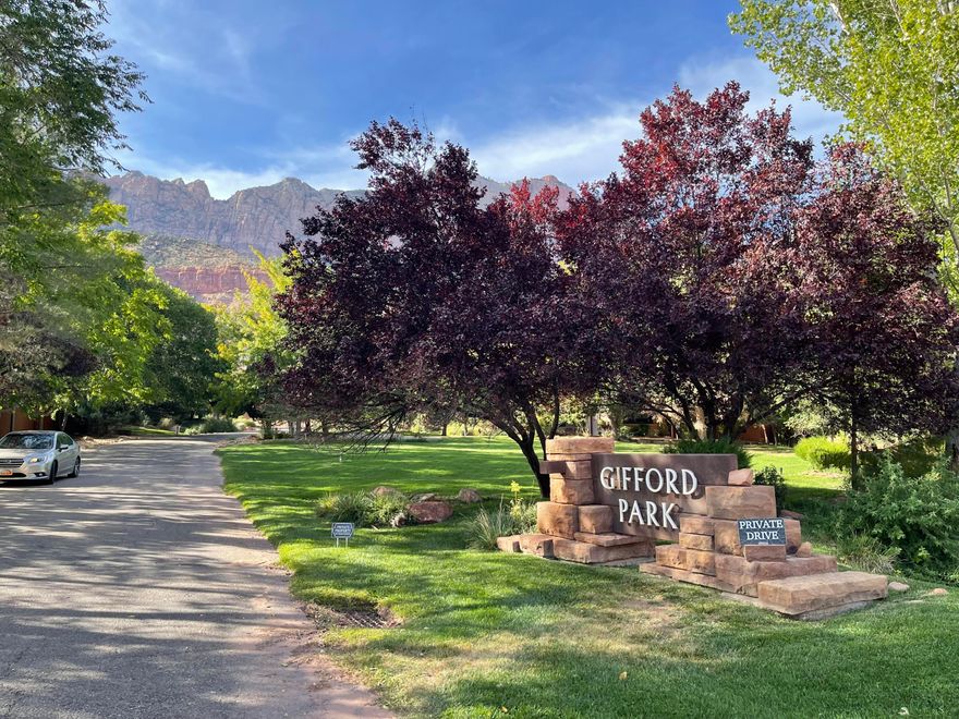 This site is different than all other buildable properties in Springdale and worth a look. It sits on the valley floor of Zion Canyon with grass, shade, incredible mountain views, and room for a pool. It's protected by Gifford Park common area and community covenants, yet just steps from restaurants, shops, the local farmers market, and the Town shuttle. If you want walkability near Zion, this is your spot. Just 1.6 miles to the ZNP Visitor center (1.8 by car) the location cannot be beat. This community boasts only 14 homesites on over 9 acres. Agent related to seller.