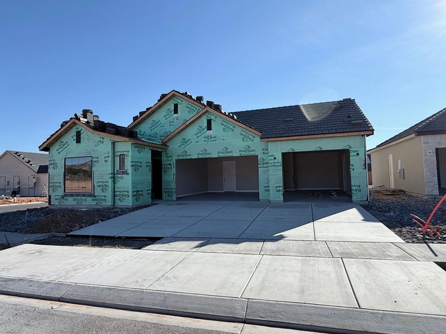 This brand new home will be ready for move in January 2026! This new SunRiver community is just West of Toquerville and will have over 1,200 homes and the amenities and lifestyle that SunRiver is famous for. 1st phase of amenities breaking ground in late 2025 and ready for use late 2026. This home is a Tara spec home with over $86K in design upgrades and comes fully landscaped. No HOA for first 2 years after closing to Founders Club (first 74 homes.) Visit www.sunriver.com to see all the details. Buy now and get larger homesites close to amenity. This home qualifies for HECM purchase, as low as $339,900 down with no