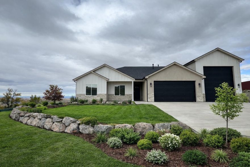 $5,000 Closing Cost Incentive and $3,000 Window Coverings Incentives if buyer uses Coal Creek Mortgage. 
Discover the perfect blend of space, style, and freedom in this brand-new 1,549 sq ft home, ideally situated on a .41-acre lot with sweeping valley views in a peaceful new subdivision with no HOA. Designed with modern living in mind, this home offers an open and inviting floor plan, ideal for families seeking both comfort and functionality. Large windows flood the interior with natural light. One of the standout features is the massive attached RV garage, perfect for storing recreational vehicles, toys, or creating the ultimate workshop or hobby space. With plenty of room to roam outside, the lot offers space for animals, gardens, or even a future outdoor oasis.