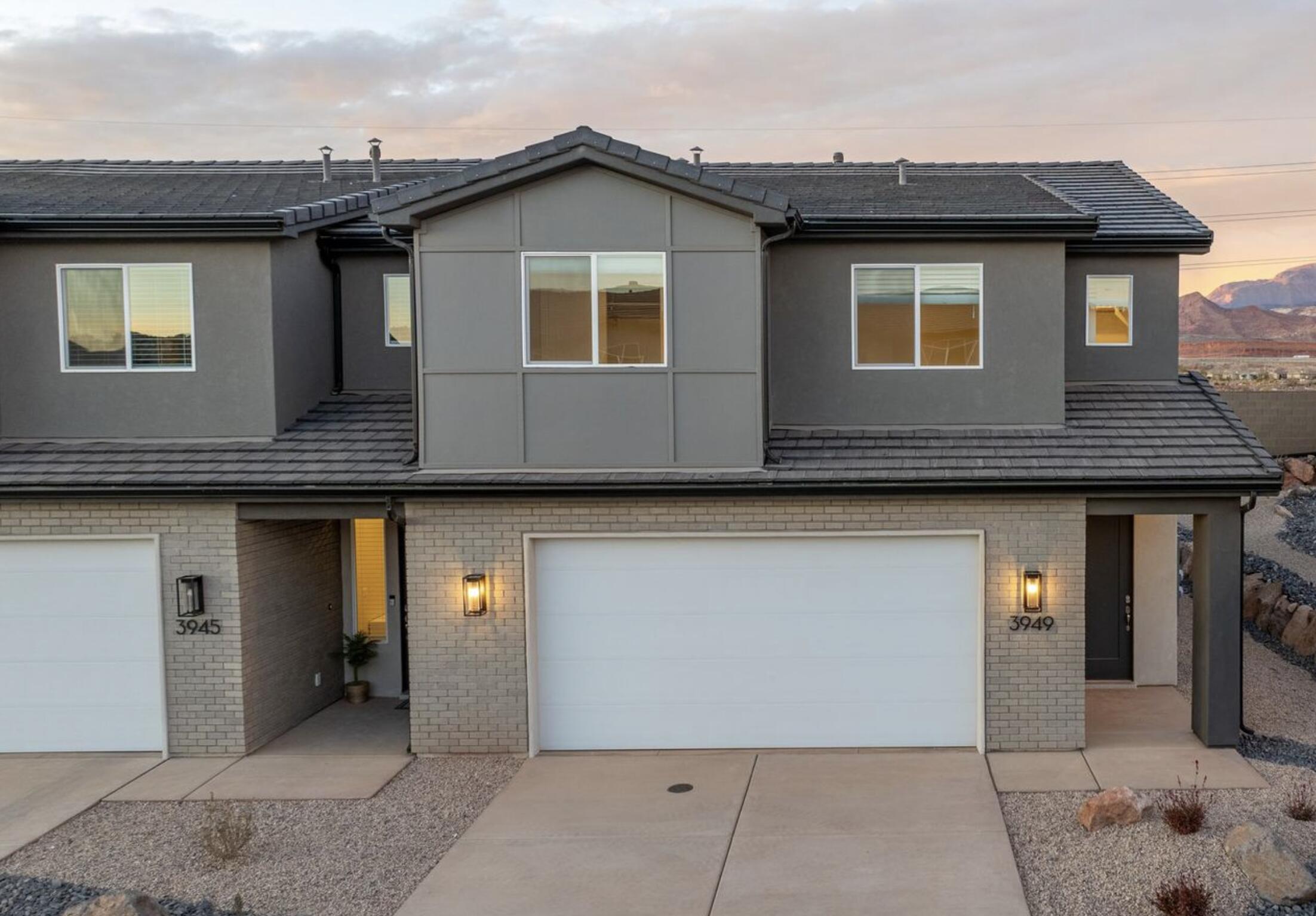 Step into The Sunrise, where versatile living meets spacious comfort. Nestled in Coral Canyon, this end-unit 2 story townhome, with 4 bedrooms and an open-concept design, is bathed in natural light from its abundant windows. Thoughtfully crafted for both relaxation and activities, the home features dual vanities, walk-in closets, and ample storage to keep life stylishly organized. The large great room and central kitchen island create the perfect setting for everyday adventures and memorable gatherings in the welcoming Coral Canyon community.