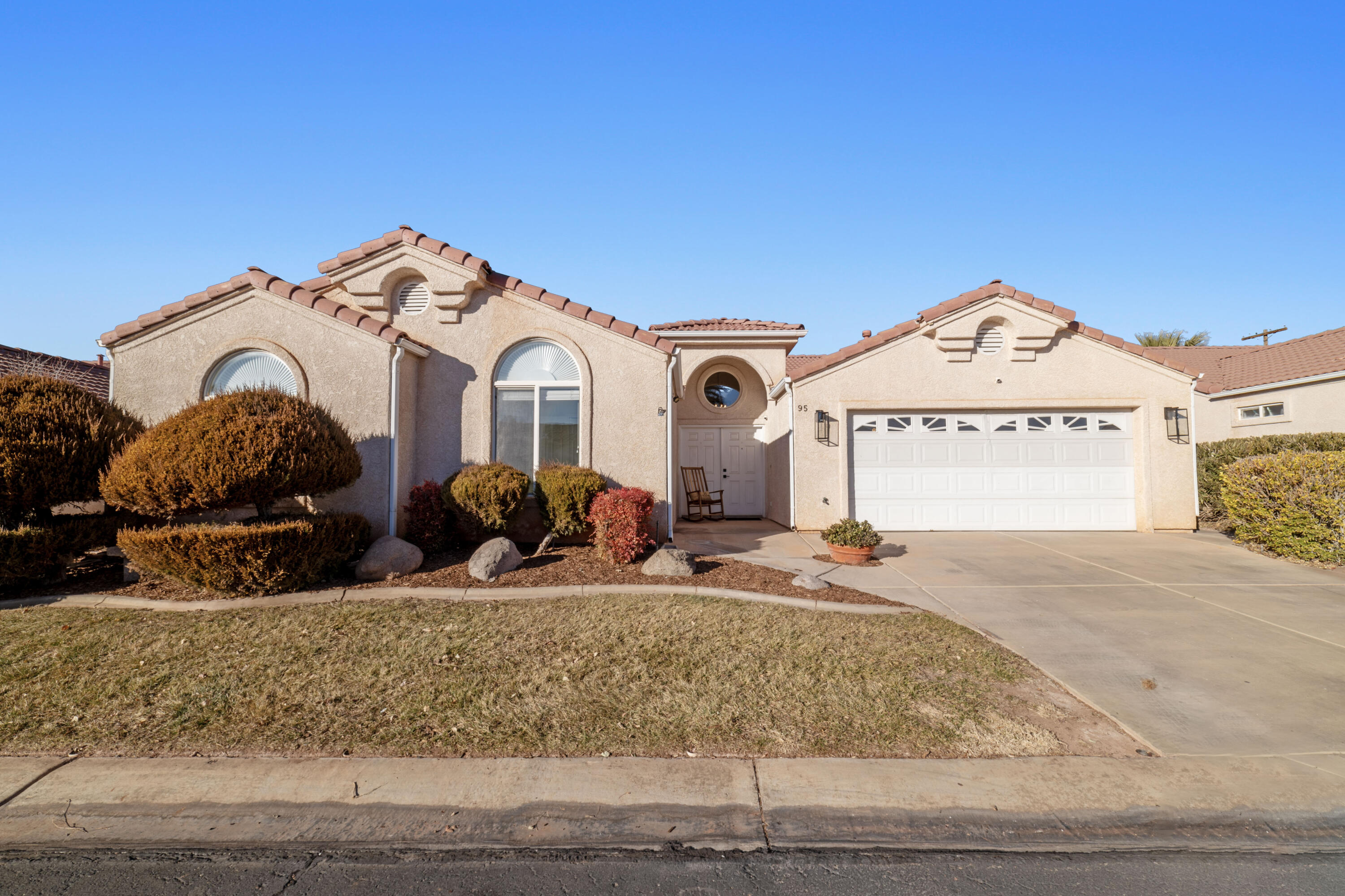 Ready to enjoy a beautifully maintained home in a sought-after St. George community? This charming property offers the perfect blend of comfort, convenience, and low-maintenance living, ideal for anyone looking to enjoy the beauty of Southern Utah.

Come inside to discover a bright and spacious living area with large windows that let in plenty of natural light. The open floor plan seamlessly connects the living room, dining area, and kitchen, creating an inviting space with high vaulted ceilings perfect for entertaining or relaxing.

The kitchen features  ample cabinetry, and plenty of counter space, making it a delight for both seasoned chefs and casual cooks. The primary suite offers a peaceful retreat, complete with an en-suite bathroom and generous closet space. Additional bedrooms provide flexibility for guests, a home office, or hobbies.

Enjoy the outdoors with a private covered patio, perfect for relaxing or dining al fresco. The community amenities include well-maintained common areas, pool, and clubhouse making it easy to enjoy a carefree lifestyle.

Conveniently located near shopping, dining, parks, and outdoor recreation, this home offers easy access to all that St. George has to offer. Whether you're a first-time buyer, downsizing, or seeking a vacation property, this home is a fantastic opportunity.

Don't miss out! Schedule your private showing today