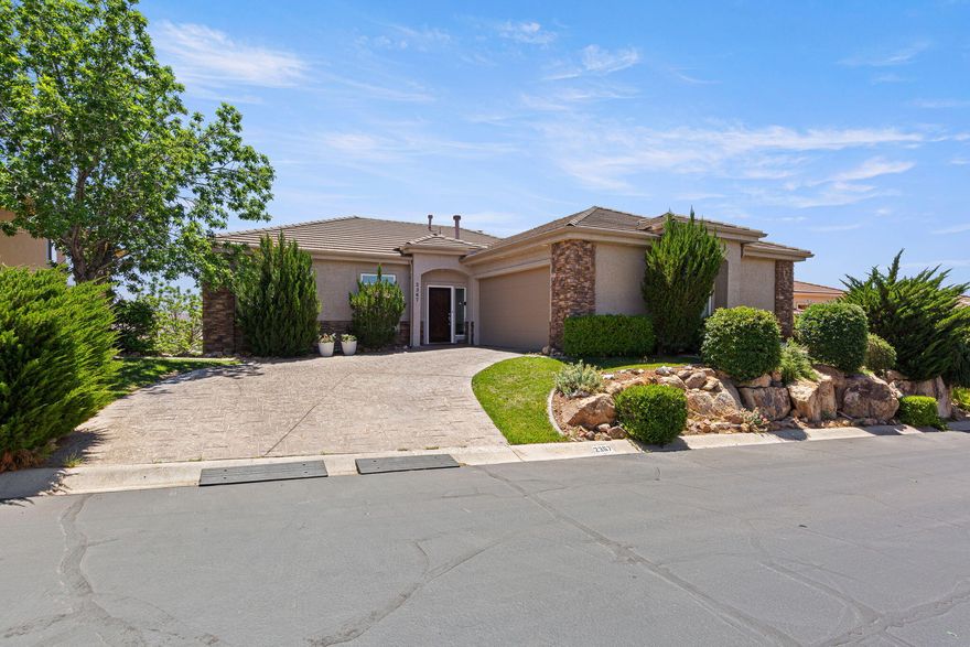 Perched atop the Bloomington Hills Golf Course, this beautifully situated home captures sweeping city and valley views that truly steal the show. Surrounded by mature trees for added beauty and privacy, the property offers a peaceful setting while still being close to all the conveniences of town. Inside, cozy up by the fireplace or unwind in the spacious primary suite featuring an en suite bathroom with a separate tub and shower. Whether enjoying sunrise views over the valley or relaxing in the shade of established landscaping, this home offers a rare combination of comfort, scenery, and location.