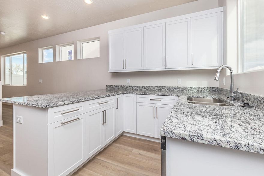 New Construction in Cedar City, Utah! This stunning 4 bed, 2.5 bath home features a spacious main-level master suite, elegant stone countertops, and 9-foot ceilings throughout. Abundant natural light and a bright fills the home, open floor plan with two inviting family rooms-perfect for entertaining or relaxing. The modern kitchen features tasteful. finishes and plenty of storage and a pocket office. Fully finished with landscape, blinds and fencing included. Thoughtfully designed for comfort and function, this home combines style, space, and convenience in a desirable neighborhood. Seller will provide up to $3,500 towards buyer's closing costs when using preferred lender.