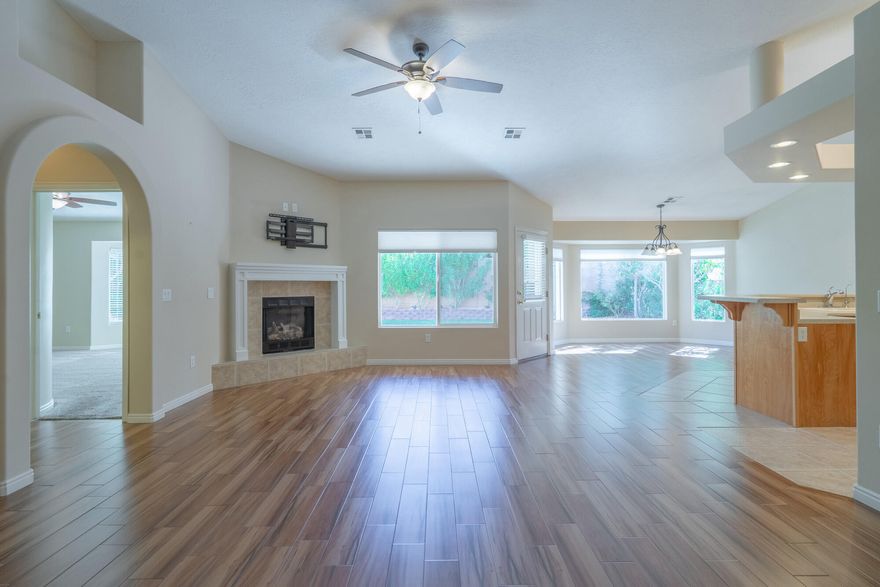 Welcome to this beautifully maintained 3-bedroom, 2-bath home in the desirable Silver Creek community. Offering 1,770 sq. ft. of open living space, this home is designed for both comfort and style. Step inside to find a HUGE master suite with bay windows, a spacious open-concept living room and kitchen, and thoughtful upgrades throughout—wood flooring and carpet, vaulted ceilings, a cozy fireplace, and spacious garage with AC/Heat unit- $26,000 walk in jetted tub. The serenely landscaped backyard offers a fully fenced oasis with lush greenery, perfect for relaxing or entertaining , complete with a private patio to enjoy year-round. Silver Creek residents enjoy resort-style amenities, including indoor/outdoor pools, a clubhouse with a gym, basketball court, library, and community events. Conveniently located just minutes from shopping, dining, golf, and parksthis home truly has it all. Don't waitschedule your private showing today! Possible seller concessions depending upon offer.