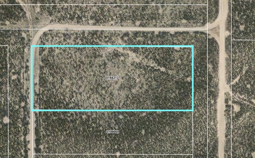 Perfect spot for a tiny home while you build.  Flat lot, Zoned R2, located near Beryl Junction providing a quick 45 min commute to St. George or Cedar. Located 500 feet from Hwy-56, the property has a County maintained dirt road on 3 sides, power lines within 100 feet, and best of all 1 AC Ft (1944) water right is included.