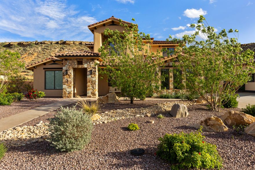 Just across the Virgin and tucked into some of Southern Utah's most stunning scenery, this exceptional home sits just 10-15 minutes from Zion National Park, offering quick access to iconic hiking, cooler mountain-influenced summers, and unforgettable views in every direction.
Set on a generous lot, the property provides privacy, open space, RV parking, and plenty of room for all your outdoor toys—perfect for those who love to explore everything this area has to offer. Whether it's hiking, biking, off-roading, or weekend adventures in Zion, this home is designed to support an active Southern Utah lifestyle.