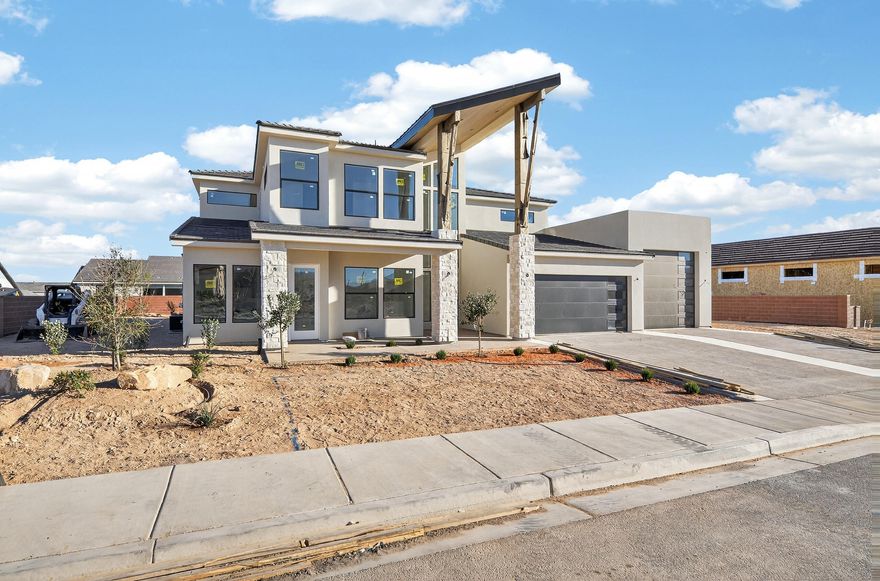 Striking new construction with modern design and flexible living spaces. This 5 bed, 4.5 bath home features an attached casita ideal for guests or potential rental income. A 2-car garage plus oversized RV/boat garage and additional parking offer exceptional functionality. The thoughtfully designed layout includes an extra upper-level family room, a dedicated theatre, and a spacious primary suite with a second laundry area. Enjoy seamless indoor-outdoor living with a covered deck and patio, perfect for entertaining or relaxing. A rare combination of style, space, and versatility in a beautifully designed spec home! Outdoor living is equally impressive with a covered deck and patio, perfect for relaxing or hosting gatherings while enjoying the surrounding views. Clean architectural lines, modern finishes, and a well-planned layout make this home as functional as it is striking.
A rare combination of design, space, and versatility this home is built to support the way you live today.