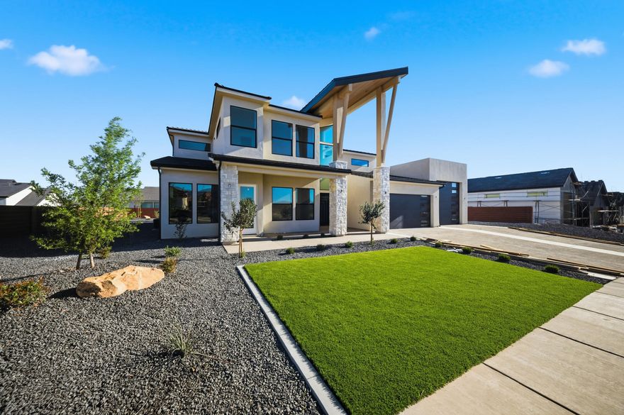 Striking new construction with modern design and flexible living spaces. This 5 bed, 4.5 bath home features an attached casita ideal for guests or potential rental income. A 2-car garage plus oversized RV/boat garage and additional parking offer exceptional functionality. The thoughtfully designed layout includes an extra upper-level family room, a dedicated theatre, and a spacious primary suite with a second laundry area. Enjoy seamless indoor-outdoor living with a covered deck and patio, perfect for entertaining or relaxing. A rare combination of style, space, and versatility in a beautifully designed spec home! Outdoor living is equally impressive with a covered deck and patio, perfect for relaxing or hosting gatherings while enjoying the surrounding views. Clean architectural lines, modern finishes, and a well-planned layout make this home as functional as it is striking.
A rare combination of design, space, and versatility this home is built to support the way you live today.