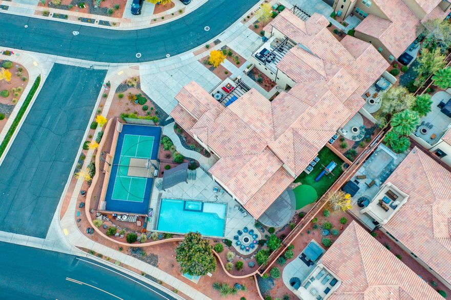 Rare opportunity to own one of the most iconic and amenity-packed homes in all of Paradise Village at Zion! This is NOT your typical vacation home — it's a private resort within a resort with features almost no other residence in the community can match. "	Private 20' x 40' fenced salt-water pool + spillover spa and dedicated kiddie splash zone
"	Private full-size Sports Court® with lighted pickleball, basketball, and volleyball
"	Expansive poolside patio with built-in BBQ, fire pit, and children's playground
"	Massive 9-bedroom, 10-bathroom layout sleeps up to 50 comfortably (6 king suites, twin suite, multiple bunk rooms, queen futons + kid sleeping pads)
"	Huge upstairs game loft with Xbox, PlayStation, Nintendo Switch on 82" 4K TV, ping-pong, and second fire pit overlooking the pool
"	Tiered theater room with recliners and additional seating
"	11 Smart TVs + blazing-fast 1 Gbps fiber internet
"	Full gourmet kitchen, giant dining areas, and open great rooms on both levels
"	Stunning red rock and Snow Canyon views from the home and upper deck
"	Ample parking with 4 car garage, driveway for 5 cars, and additional parking lot across the street

Steps from the home you'll find Gubler Park (splash pad, additional pickleball, playgrounds) and everything Paradise Village is famous for: Kids' Cove water park, lazy river, two resort pools, two 20-person hot tub, clubhouse, and fitness center.

Perfectly positioned in Santa Clara minutes from Tuacahn Amphitheater, Snow Canyon State Park, baseball & soccer tournament fields, Black Desert Resort, world-class hiking/biking/ATV trails, 10 golf courses, lakes, shopping, and restaurants, and an hour from Zion National Park.

Proven rental superstar with strong booking history, yet equally ideal as a legacy family retreat or corporate/group gathering estate. Private pool + private pickleball homes rarely come available, don't miss this one!

* SEE EXCLUDED ITEMS IN DOCUMENT SECTION OF THIS LISTING.
* SEE LUXURY HOME FEATURES IN DOCUMENT SECTION OF THIS LISTING.
* SHOWN BY APPOINTMENT ONLY