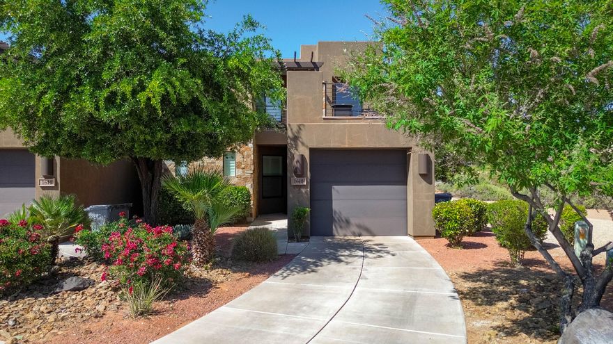 Perched along the 18th fairway of the world-class The Ledges Golf Club, this beautifully appointed two-story townhome offers the perfect blend of luxury, recreation, and investment potential. Currently operating as a successful vacation rental, the home comes fully furnished and turnkey ready. Enjoy breathtaking views of the manicured golf course and majestic Pine Valley Mountain from both the private ground-level patio and expansive rooftop patio--ideal for relaxing sunsets or entertaining guests. Located just minutes from Snow Canyon State Park, outdoor enthusiasts will love the easy access to world-class hiking, biking, and walking trails. Residents and guests alike will appreciate being directly across the street from the community pool and pickleball courts, creating a resort-style atmosphere year-round. Whether you're searching for a personal getaway, income-producing property, or both, this exceptional townhome delivers the ultimate Southern Utah lifestyle.