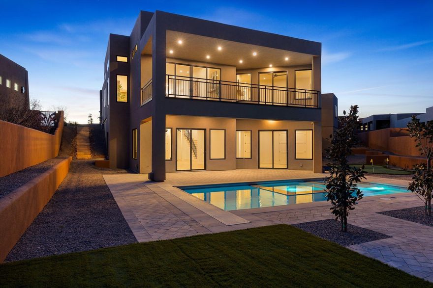 Experience elevated desert living in this stunning new construction home, perfectly positioned on one of Southern Utah's most sought-after golf courses. Spanning over 4,000 square feet, this 4-bedroom, 4-bath residence seamlessly blends modern luxury with breathtaking natural surroundings.

Designed for both comfort and entertaining, the home features a spacious walkout basement complete with a kitchenette--ideal for guests, multi-generational living, or a private retreat. Upstairs, an expansive deck captures sweeping views of Southern Utah's iconic red rock landscapes, creating the perfect setting for sunrise mornings and unforgettable evenings.

The outdoor space is equally impressive, highlighted by a private pool that offers a resort-style escape right in your backyard. A rare combination of functionality and luxury continues with a dedicated boat garage, providing ample space for all your toys, convenient since you are 5 minutes from Sand Hollow.