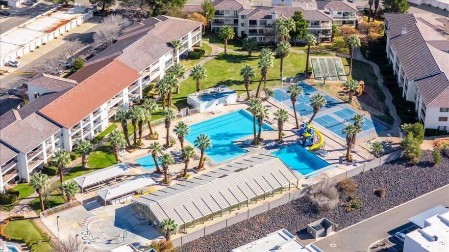 LOCATION LOCATION! This Las Palmas Condo is in the perfect location. Hard to find ground floor unit next to the 4 pools, waterslide, & splash pad. This fully furnished unit is ready for you to relax and enjoy or rent out to help with expenses. AirBnB and VRBO approved. Enjoy hiking and biking in the red rocks or play pickleball and basketball right out your door. Great exercise area in clubhouse. Golfing, Snow Canyon and Zions National Park are a few of the highlights nearby.