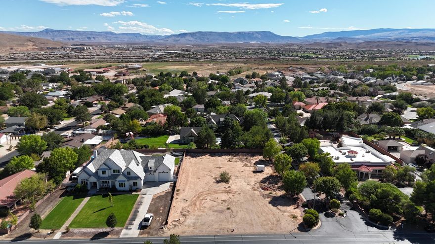 Come build your dream home on a hard to find almost half acre lot in Bloomington Utah. The location is across the road from the Bloomington Golf Country Club. Near Parks, Biking Trails, Hiking trails and schools. 

No Hoa for this location. 

Building plans have been designed and engineered for 5985 sqft home. Seller is also a builder and is open to working with you to build your dream home.