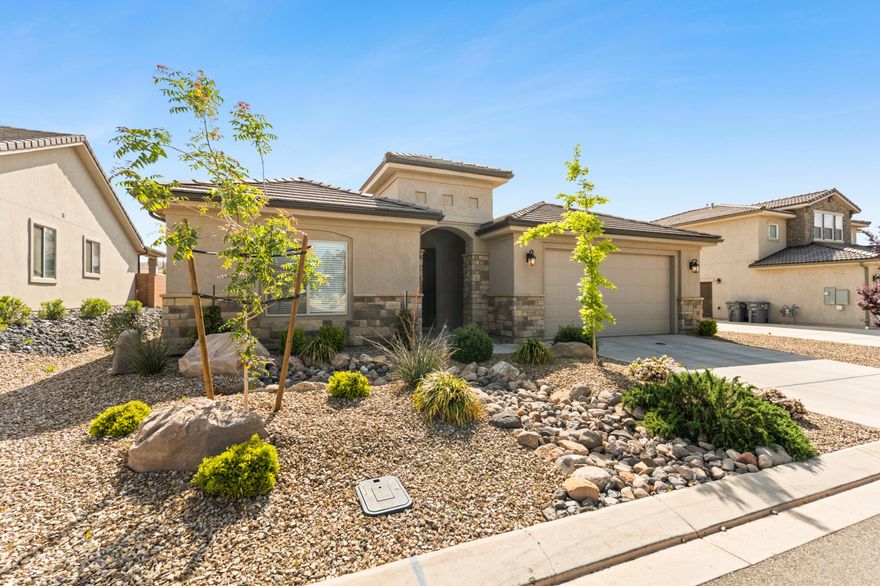 Very popular and well-performing VACATION RENTAL with strong income history and future bookings already in place, an incredible investment opportunity! Being sold FULLY FURNISHED with higher-end furniture and décor, it's truly turnkey and optimized for rentability. Located in a resort-style community offering a pool, spa, splash pad, park, pickleball courts, and convenient RV and trailer parking for guests, this property is designed to attract and accommodate visitors. Just minutes from shopping in St. George and premier recreation including Sand Hollow, Quail Creek, Snow Canyon, and Zion National Park! This home is well maintained featuring a spacious open floor plan flooded with natural light, and beautiful modern finishes throughout. Additional highlights include a large laundry room with a sink and storage space, plus a great backyard with a large, covered patio and added privacy, perfect for relaxing or entertaining. Buyer to verify all information, deemed reliable, however buyer to verify all info including utilities, rental restrictions, and HOA information if applicable.