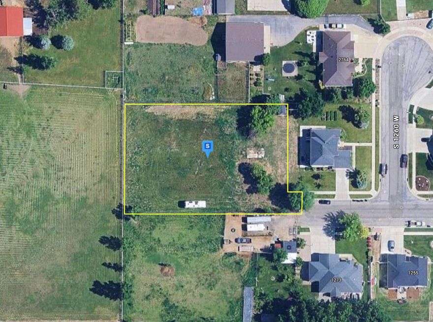 PLEASE do not disturb residents of adjacent home under any circumstance. Don't miss this rare opportunity to own a spacious 0.78-acre vacant lot tucked away in a desirable, established Syracuse neighborhood with no HOA. Offering ample room to design your ideal home, this peaceful setting combines privacy with exceptional convenience. Enjoy quick access to UT-177, local schools, shopping, and everyday amenities—all while being surrounded by well-kept homes and a welcoming community. A prime piece of land in a sought-after area, ready for your vision to come to life. Buyer to verify utilities and buildability.