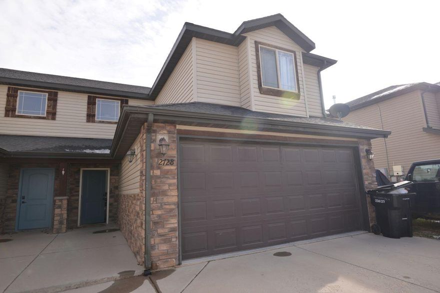 Welcome to this cute and spacious 3-bedroom, 2.5-bath twin home that offers comfort, privacy, and freedom with no HOA. The thoughtfully designed layout provides generous living space, including an open main level perfect for everyday living and entertaining. Upstairs bedrooms are well-sized, with a private primary suite featuring its own bathroom. Step outside to enjoy a large, private yard ideal for relaxing, gardening, pets, or outdoor gatherings. A 2-car garage adds convenience and extra storage. This well-kept home combines functionality and charm with the added bonus of no association restrictions, making it a rare and desirable find.