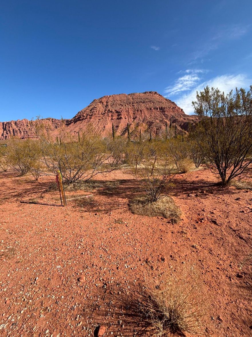 Exclusive Kayenta lot, Ivins, UT. Immerse in tranquility on this premium .41-acre land, where luxury meets artistry. Nestled discreetly among red rock canyons, each homesite harmonizes with nature, offering peace, privacy, and panoramic views. Embrace Kayenta's upscale, creative spirit—a haven for discerning buyers. Your canvas awaits in Utah's most picturesque landscape. A true masterpiece in the desert! *Washington County Water Conservancy District Fee paid!*