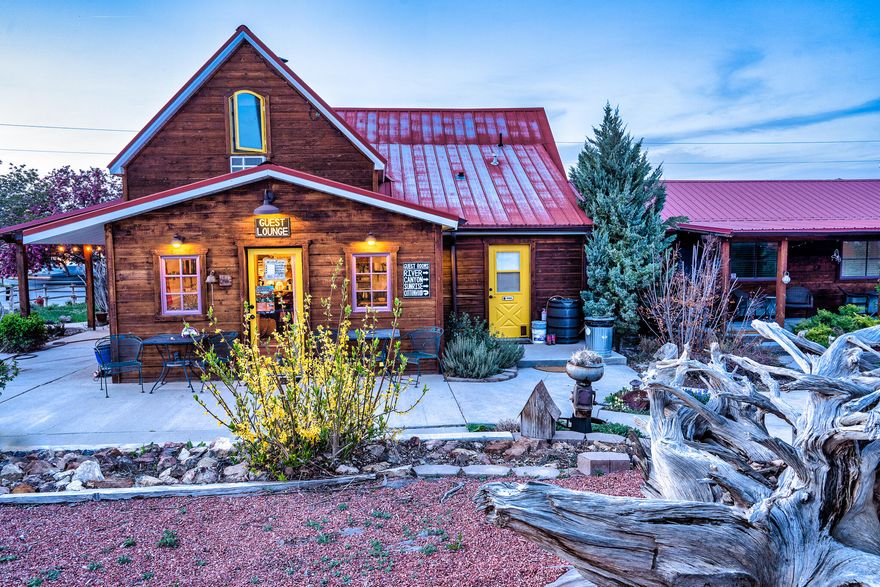 Ideally situated along Utah's iconic Highway 12 Scenic Byway at the gateway to the Grand Staircase-Escalante National Monument, the Loubird Inn is a thoughtfully restored 1905 homestead reimagined as an art-forward retreat in the heart of Escalante. Featuring curated interiors, lush gardens, and inviting outdoor spaces that inspire connection, reflection and relaxation, this is an exceptional opportunity to own a distinctive hospitality property with an established brand, loyal guest following, and room for growth- all in one of Southern Utah's most unique, and increasingly popular travel destinations.

This highly rated Inn is within walking distance to local shops and dining and attracts both domestic and international travelers seeking a place to rest and renew after a day on the road or hiking trails. 
 
The property currently features four private, creatively designed guest suites, each with en-suite baths, private entrances, and modern comforts, as well as a two-bedroom home ideal for owner occupancy or additional rental income. 
Other significant features include-

Two RV pads with full hookups (sewer, water, electric)

A detached garage that serves as the laundry facilities and storage for the Inn (could potentially be converted to living quarters). 

.5 shares of New Escalante Irrigation District water. 

All FF&E 

Two separate parcels totalling .79 acres of commercial/residential zoning offers flexibility for expansion.

The Loubird Inn is truly the jewel of Escalante, Utah. With high visibility properties of this caliber rarely coming available in this charming little town, this is an exceptional opportunity to buy and expand on what is already a highly successful business.