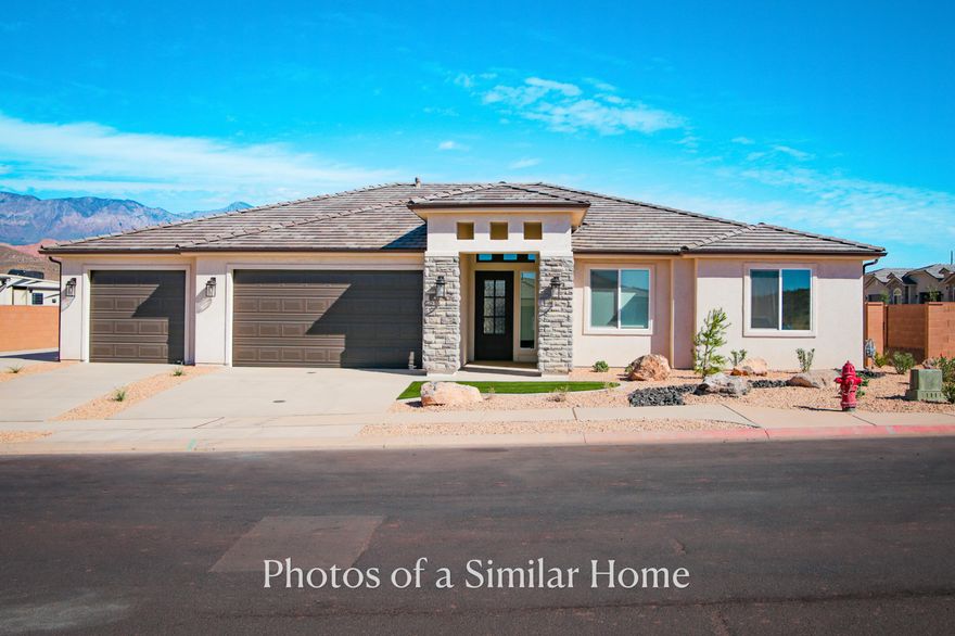 Soon to be built by Gemstone Custom Homes! (Photos are of previously built home of this same floor plan)      Come in soon if you want to personalize this home with customizations. We have a very special layout here with a guest suite on a corner lot. The listed price includes many upscale features like a finished backyard with automatic drip irrigation, gated RV parking slab with full hookups (50-amp electric, sewer dump, water), full perimeter block wall, seamless gutters, heavy iron front door for both security and WOW factor, tile floors throughout the main living areas and bath and laundry rooms, Solid hardwood cabinet doors with boxes made of 9-ply birch, large covered back patio, stand alone tub in the owner's bathroom, all ceilings 9' or higher, over the stove ventilation hood, built-in wall oven and microwave, classic gas fireplace with stone hearth and mantle, fully tiled master shower with a recessed floor, tankless water heater with recirculating pump, and views you'll need to see in person!
Photos are of similar home, finishes will vary. Contact listing agent for more info.