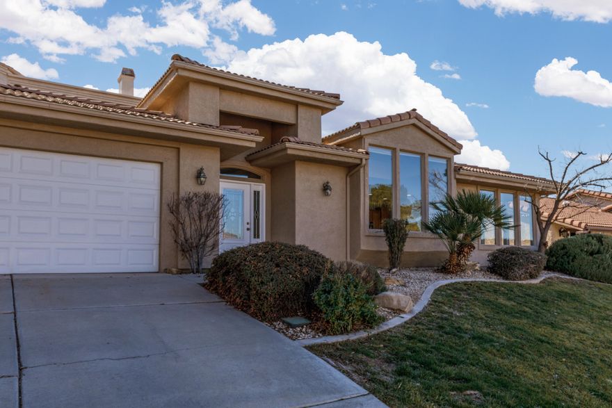 Mountain Views you have to see to believe! Big windows in Great room and Dining room to enjoy the views. Freshly painted interior. NEW sculptured carpet. NEW quartz countertops and NEW fixtures in Kitchen and bathrooms. Spacious entry with lovely tile detail. Tall ceilings with NEW fans with lights, all on wall controls. Primary Suite has separate tub and shower, 2 sinks with new Quartz counters, wall mirror, and walk-in closet in the bedroom. Laundry room has cabinets, a shelf and a large linen closet. Convenient location close to downtown St George, Southgate Golf Course, parks and walking trails along the river. Close to new retail and restaurants. Relax in the community indoor and outdoor Pool. Keep fit with exercise equipment in the clubhouse. HOA covers your water, garbage, lawn roads and there is a common area grassy lawn near clubhouse.