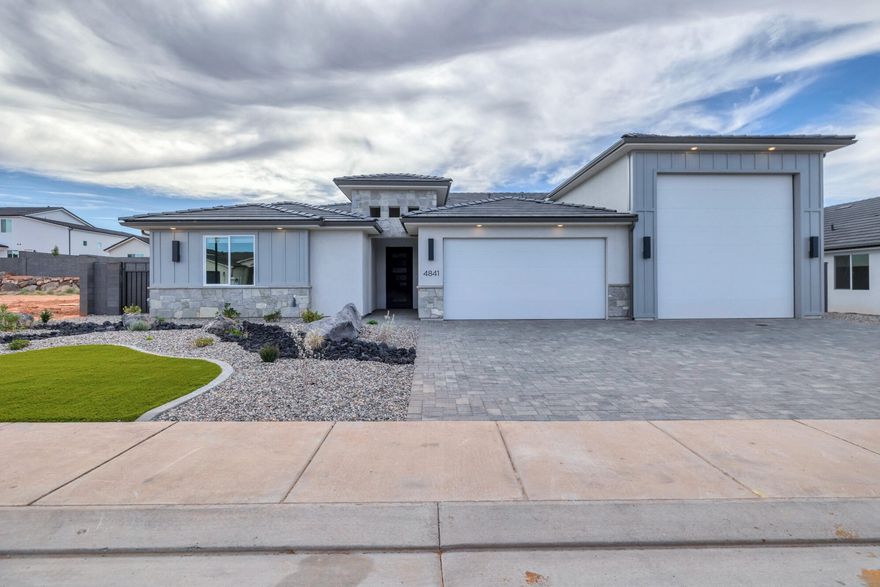 Immaculate 4-Bedroom Home with Private Casita, RV Garage & Designer Finishes. Step into style and comfort in this beautifully upgraded 4-bedroom, 3.5-bath home featuring a flexible layout designed for modern living. A standout feature is the attached private casita—perfect for multi-generational living, guests, or use as a second primary suite. The open-concept living area showcases a cozy fireplace framed by custom built-ins, ideal for both entertaining and everyday relaxation. The spacious kitchen flows seamlessly into the main living space, creating a bright and welcoming environment. The massive 17' x 45' RV garage, in addition to the 2-car garage—providing parking for 4+ vehicles. Additional highlights include striking coffered ceilings, stylish shiplap accents, and high-end finishes