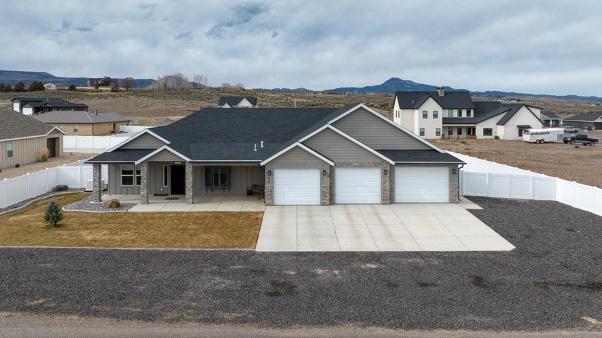Experience like-new living in beautiful Panguitch, Utah! This home is practically brand new. This 4-bedroom, 2-bath home sits on a spacious 0.40-acre lot with expansive mountain views--perfect for enjoying cooler summers and the charm of small-town living. An open-concept floor plan blends the living, dining, and kitchen areas for effortless everyday comfort and entertaining.
Standout features and upgrades:
Preinstalled permanent programmable exterior lighting for year-round ambiance and curb appeal
Garage lover's dream: 3-car tandem garage with oversized third bay (approx. 48 ft x 18 ft), fully insulated with sleek epoxy floors
26kW whole-house natural gas Generac backup generator for peace of mind
Solar system to help offset energy costs
Security screen metal doors on the fron Security screen metal doors on front and rear entries
Massive gated RV parkingbring your toys and trailers with room to spare
Leaf gutters for low-maintenance exterior care
Fully equipped greenhouse with planters inside and out with water and power ready to be planted with plants of your choice.
Tankless water heater for on-demand efficiency(
Enjoy sunset views over the mountains from your generous yard, with plenty of space to garden, play, or expand. Convenient location for outdoor recreation, Bryce Canyon and nearby lakes, plus all the essentials of Panguitch just minutes away. Modern efficiency, thoughtful upgrades, and room to roamthis is the one you've been waiting for.