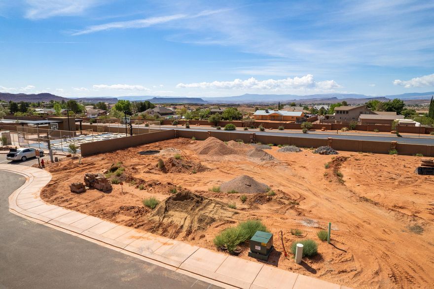 Newly released, north facing home lot at The Palisades at Snow Canyon. This master-planned gated community offers beautiful homes at the foot of Red Mountain and Snow Canyon State Park. Enjoy private homeowner amenities, including clubhouse, sport courts, pools, walking trails, and more. Choose among one of the Palisades Approved Builders and build your dream home.