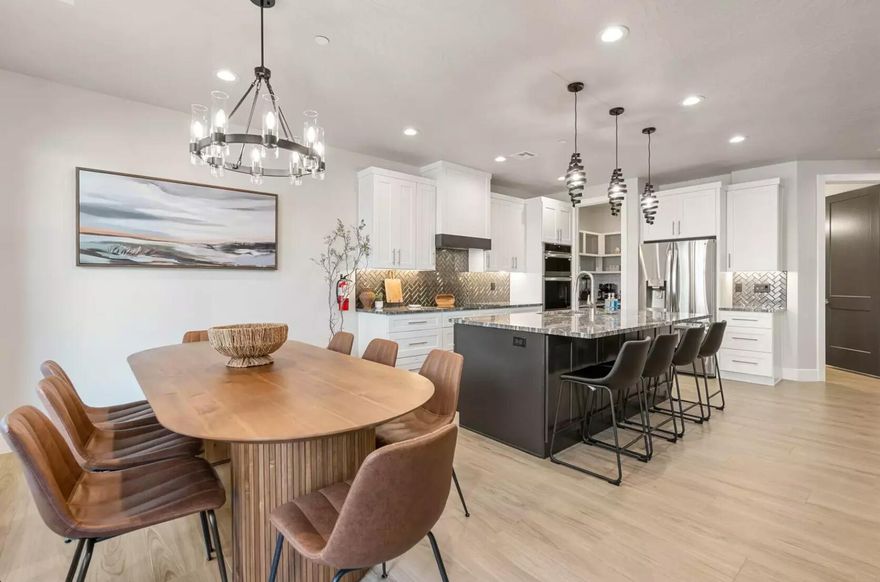 Fully furnished, turnkey, established Vacation Rental at Pecan Valley Resort.  Welcome to Canyons Edge, a gorgeous 3-bed, 3.5-bath retreat in Hurricane—just minutes from Sand Hollow Lake and steps from the community clubhouse and amenities. Sleeps up to 12 and features two ensuite bedrooms with private balconies, a well-appointed kitchen, fire place and multiple entertainment options including shuffleboard, ping pong, basketball shoot-out, card games, and a Nintendo Switch.

Enjoy a private hot tub, BBQ grill, inviting outdoor seating, and two designated parking spaces. Guests also receive access to the brand-new Pecan Valley Resort amenities, including a wave pool, lazy river, waterslides, pool, clubhouse, arcade, and more.