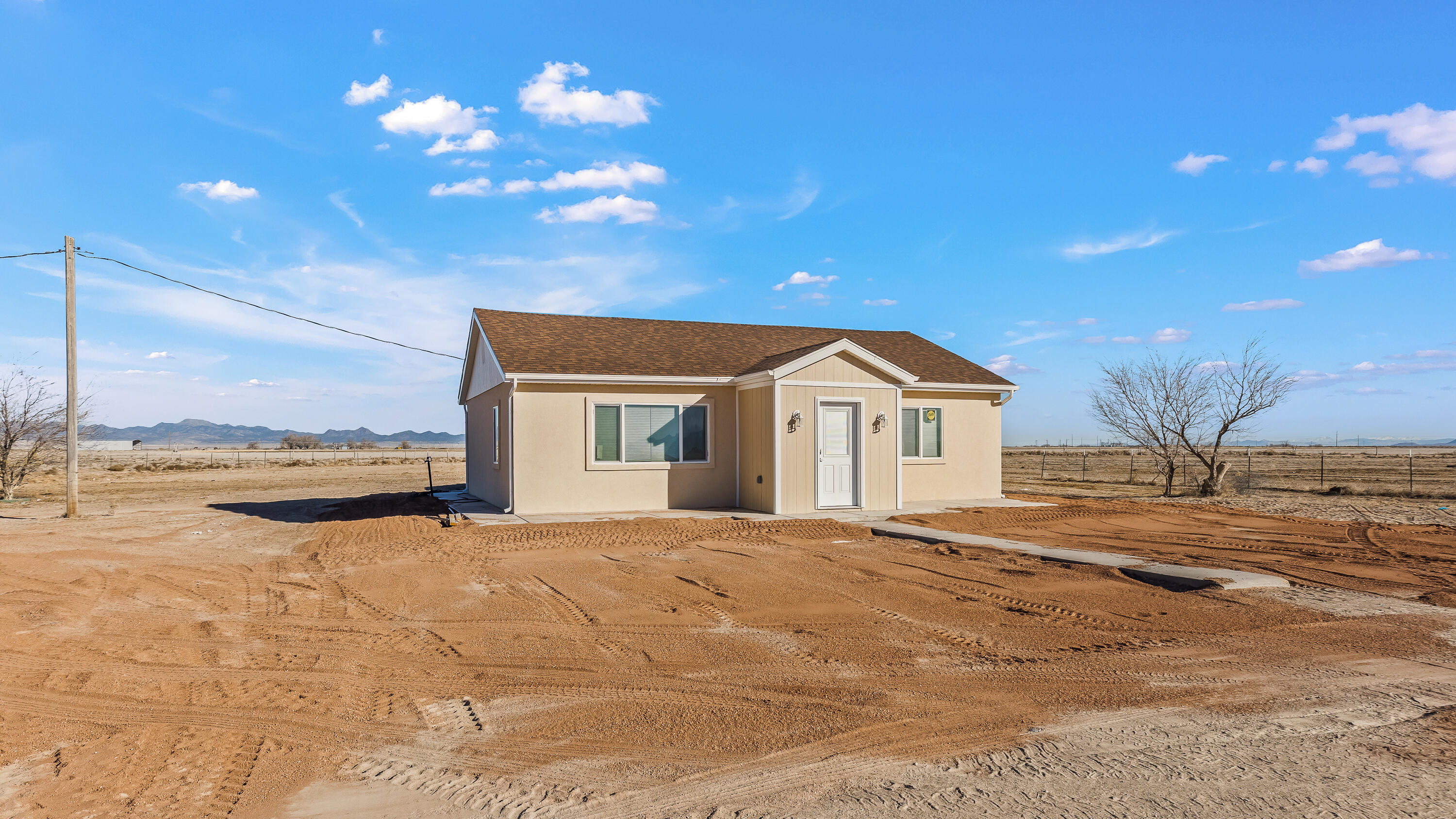 Now showing/move in ready. Built in 1949 and completely renovated in 2025. Home is 1,404 sqft, 3 bedrooms, 1 bath, on 3.72 acres of land with corrals for animals and a shed. Good working well and 0.50 acft of water right #71-174 (priority date 1924). Renovations included, new walls, new soft close cabinets, new granite countertops, new paint, new flooring, new roof, new electrical, new plumbing, new appliances, new water heater, newly installed AC/Heat, new windows/coverings, new doors, practically everything is brand new. Large windows. Great mountain and valley views. Large basement storage room. Great for someone looking for horse property or just space. Plenty of room for a garage / large shop. RV parking. Only 45 min to St. George or 45 min to Cedar City. Owner Agent.