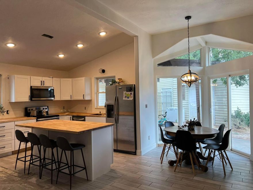 Welcome to this turnkey investor opportunity or house-hack special in the heart of Hurricane! This home has NO HOA with a floorplan that maximizes income with three distinct spaces: a spacious 2-bed/1.5-bath main residence with full kitchen/laundry, plus two private studios. All bedrooms / suites feature a mini-split for custom comfort.

''The Garden Suite'' Private back entrance. 1 br, 1 bath studio with kitchenette

''The Studio Suite''  Private right-side entrance. 1 br, 1 bath studio with kitchenette. Optional access to laundry via a double-deadbolt door.

Prime location! 23 miles to Zion NP, 0.2 miles to Pioneer Park, 0.6 miles to the city park, and 0.4 miles to Hurricane Laundromat for studio tenants.

Disclosure: Many interior photos prior to tenants occupying the home.