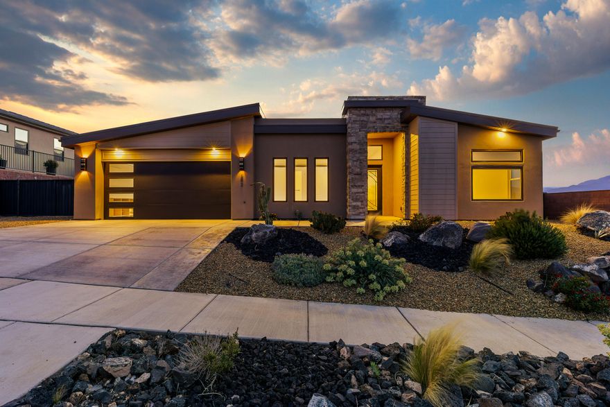 Perched on a premium corner lot, this exceptional luxury residence captures sweeping, unobstructed views of Pine Valley Mountain, the striking Coral Cliffs, and the distant peaks of Zion--offering a truly iconic Southern Utah backdrop. Designed for both elevated living and effortless entertaining, the home features 4 spacious bedrooms and 3.5 baths, including a private casita complete with its own entrance and kitchenette--perfect for guests, multigenerational living, or rental potential.

The backyard is a resort-style retreat, showcasing a sparkling pool, relaxing hot tub, and ample space to unwind while taking in the surrounding red rock beauty and mountain vistas. Inside, the home boasts refined finishes, open-concept living spaces, and an abundance of natural light that frames the stunning scenery from every angle.

With its rare combination of privacy, views, and versatile living options, this property offers an unmatched lifestyle in one of Southern Utah's most breathtaking settings.