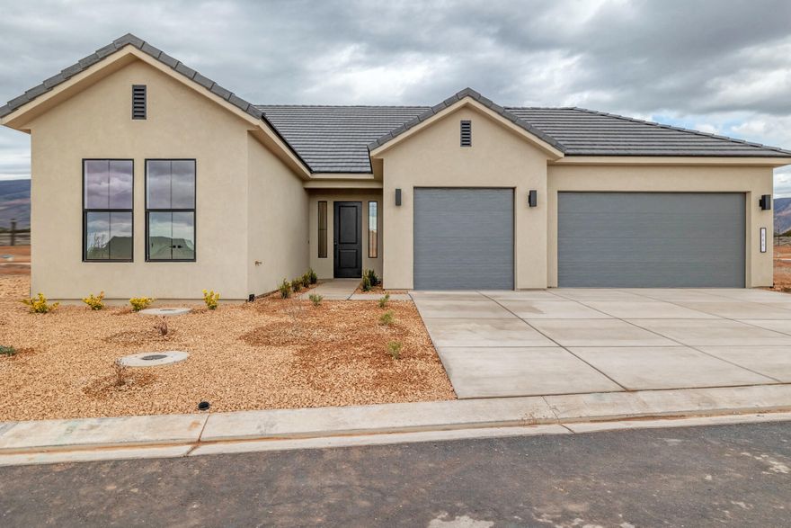 This brand new home will be ready for move in by Christmas!! This new SunRiver community is just West of Toquerville and will have over 1,200 homes and the amenities and lifestyle that SunRiver is famous for. 1st phase of amenities breaking ground in late 2025 and ready for use late 2026. This home is the Hamlet spec home with over $67K in design upgrades and comes fully landscaped with oversized 3 car gargage. No HOA for first 2 years after closing to Founders Club (first 74 homes.) Visit www.sunriver.com to see all the details. Buy now and get larger homesites close to amenity. This home qualifies for HECM purchase, as low as $339,900 down with no mortgage payment if over 62 years old, for qualified borrowers.