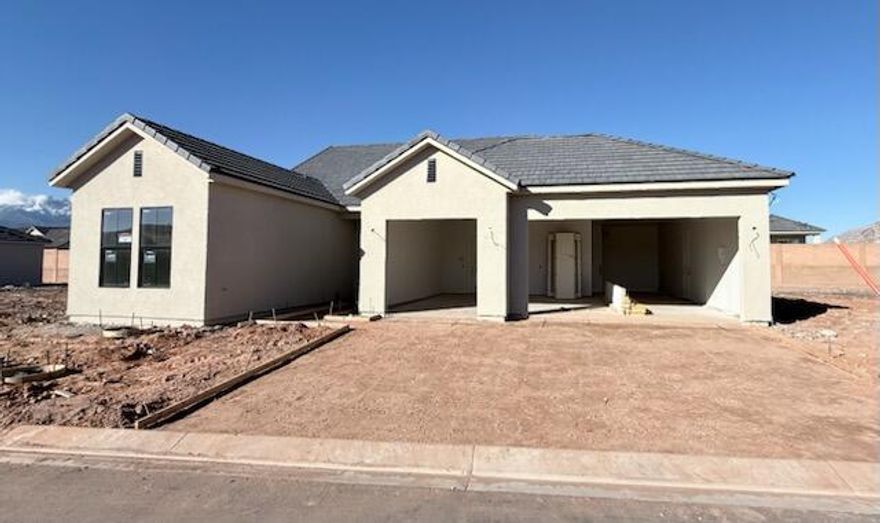 This brand new home will be ready for move in by Christmas!! This new SunRiver community is just West of Toquerville and will have over 1,200 homes and the amenities and lifestyle that SunRiver is famous for. 1st phase of amenities breaking ground in late 2025 and ready for use late 2026. This home is the Hamlet spec home with over $67K in design upgrades and comes fully landscaped. No HOA for first 2 years after closing to Founders Club (first 74 homes.) Visit www.sunriver.com to see all the details. Buy now and get larger homesites close to amenity. This home qualifies for HECM purchase, as low as $339,900 down with no mortgage payment if over 62 years old, for qualified borrowers.