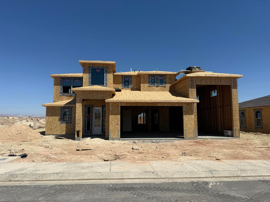 Looking for a home with an RV garage in St. George with no HOA?  This is the home!  New Community and New Floorplan Alert!!!  This thoughtfully designed 2-story residence offers 2,744 SQFT of highly functional living space, perfect for both everyday comfort and entertaining. Featuring a highly sought-after RV garage, there's plenty of room for all your toys and storage needs. Step inside to discover a gourmet kitchen with elevated finishes throughout, highlighted by a massive island that serves as the heart of the home--ideal for gatherings, meal prep, and making memories. The open-concept layout flows seamlessly to a large covered patio, creating the perfect indoor-outdoor living experience. Upstairs, you'll find a spacious loft centrally located between the bedrooms, offering a versatile second living area, media space, or playroom. Every detail of this home has been designed with functionality and style in mind. This is a home you won't want to miss!