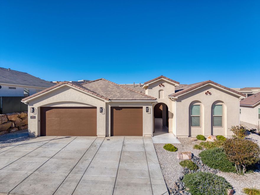A private 310 sq ft Casita with separate entrance highlights this beautifully designed home in the Divario community. Additional features include a 3-car garage, inviting Courtyard with fireplace, and a walking path located directly behind the home. Low HOA fee.