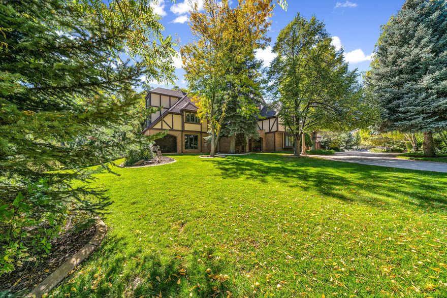 A rare opportunity to own a private 3-acre estate near Zion, designed for unforgettable experiences and limitless potential. Tucked inside Deer Hollow behind a gated, tree-lined drive, this enchanting Tudor-style home features 11 themed bedrooms, three full kitchens, and space that adapts to your lifestyle—whether that's a peaceful family retreat, luxury short-term rental, or boutique event venue.

The west wing currently operates as a successful Airbnb with a separate 3 bed, 3 bath suite. A sunroom overlooks a stocked freshwater pond and dock, while the property also includes a garden kitchen, orchard, greenhouse, and shared well water—perfect for farm-to-table events or self-sufficient living. Additional 7 acres are available for purchase, featuring a 2-bedroom guest house, spacious shop, and room to expand your vision into a vineyard, artist's retreat, or wellness center. Located just across from Kolob Canyons (Zion National Park), near Brian Head Ski Resort and Cedar Breaks, and only 30 minutes to flights from Cedar City or St. George.

Whether you're seeking a legacy property, income opportunity, or serene escape, this estate delivers. Private, magical, and built for something extraordinary.