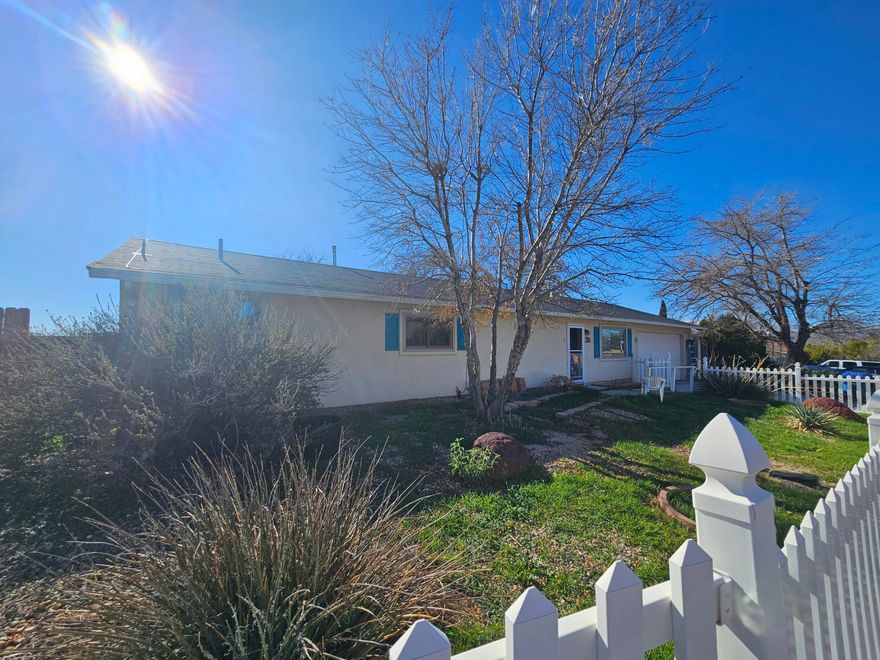 NO HOA-  This stick-built home, .16-acre corner lot, is brimming with potential and ready for your personal touch! Featuring 3  bedrooms and 2 full bathrooms, also includes 200 sq ft finished outbuilding. The kitchen boasts newer appliances, including a gas range and tile floors. It presents a great opportunity for customization.
Key updates include new windows throughout and new entry doors - warranty transfers, ensuring improved energy efficiency and curb appeal. The cozy electric  fireplace in the living room offers the perfect spot for relaxation and gatherings.

Additional features include an oversized garage with plenty of space for storage.