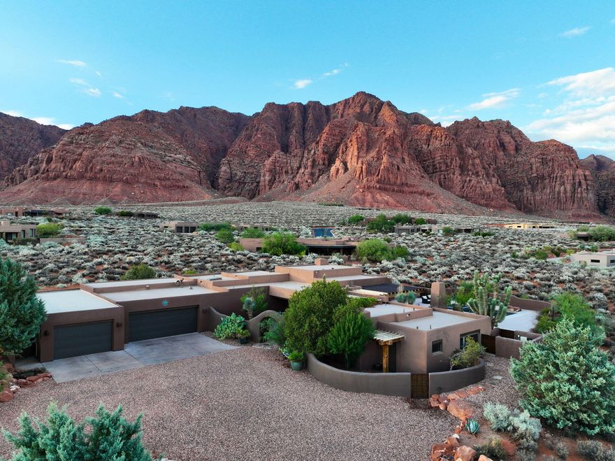 Kayenta Art Community, This desert haven sits on 1.5 acres with panoramic Red Cliff views that stretch endlessly ACROSS your private patio and outdoor entertaining spaces. Imagine evenings by the heated pool & spa, surrounded by the colors of the desert sky. THIS home also features a charming one-bedroom Casita, perfect for guests or private retreat space. With biking and walking trails just steps away, Snow Canyon State Park, Tuacahn Amphitheater and PETROGLYPHS minutes from your door, every day here feels like a vacation.