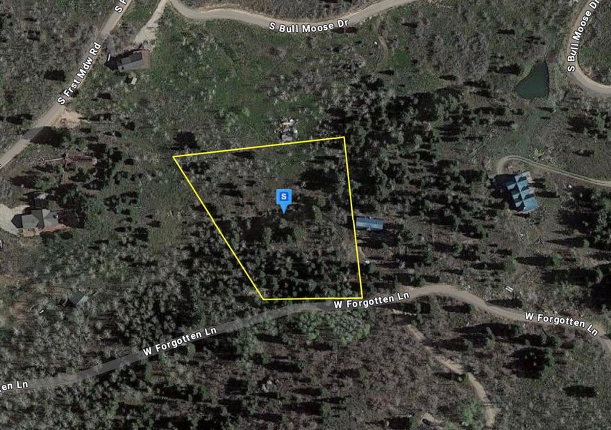 Located in the scenic Forest Meadow Ranch Subdivision, this 2-acre vacant lot offers a stunning mountain setting adorned with massive pine trees and aspens across a gentle, sloping landscape. With water available and the $12k tap fee already paid (septic required), the groundwork is set for your future build. Enjoy close proximity to Park City's world-class skiing, dining, and nightlife, along with easy access to Rockport Reservoir for boating and outdoor recreation. A convenient commute to Salt Lake City adds to the appeal, making this a remarkable opportunity to create your own private mountain sanctuary.