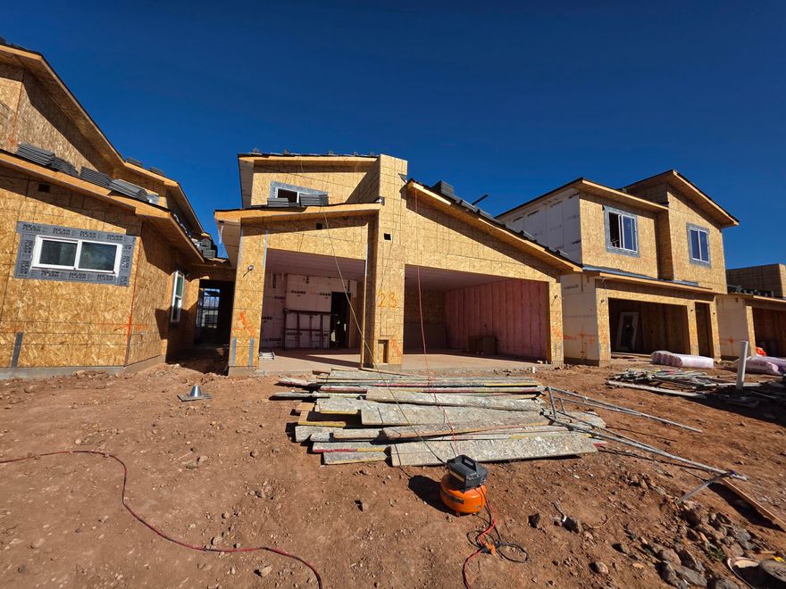 Luxury townhome located at The Front 9 at Sky Mountain with main-level living and a rare third-car garage. The primary suite, laundry, kitchen, and great room are all on the main floor for easy day-to-day living. Enjoy a private interior courtyard plus an enclosed backyard with a dedicated 220V outlet ready for your personal hot tub. The great room soars to over 19 feet, bringing in natural light and an open, airy feel. Upstairs adds three guest bedrooms, a full bath, and a second living area for work, play, or guests. The HOA covers exterior maintenance and insurance, and your amenities package included in this purchase includes access to the community pool, hot tub, and pickleball courts. Buyer to verify all information, including HOA coverage and inclusions. Call today to set up a showing.