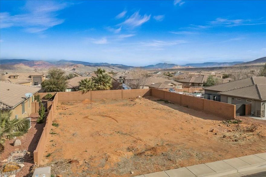 Seize the opportunity to build your dream home on this .23-acre lot in the highly sought-after Dixie Springs community in Hurricane, UT. Bring your own builder and design the perfect space whether it's a custom home with an RV garage for all your toys or a retreat tailored to your lifestyle. Nestled near Sand Hollow Reservoir and sand dunes, you'll have endless outdoor adventures all year long. This lot offers direct SXS access from your garage to world-class trails. Enjoy the freedom of no HOA in a thriving area with stunning surrounding landscape and views. Dixie Power is one of the most affordable electricity companies in the Nation which services this lot and property taxes are low, making this Southern Utah location a prime opportunity. With utilities stubbed and ready, all block walls finished, water fee's paid, and the flexibility to create your ideal setup, this is the perfect spot to invest, build, and play. Don't miss this incredible opportunitycall for more info to