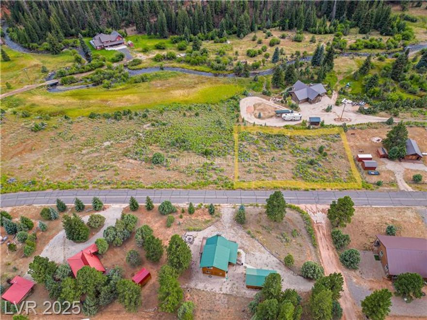 Calling all adventurers! This flat, build-ready lot in Aspen Highlands is your base camp to endless exploration. With Mammoth Creek rushing just behind the property and epic mountain views in every direction, nature surrounds you at every turn. Nestled among rustic cabin homes with easy, year-round access off a paved road, you're perfectly positioned for adventure. Just minutes from Panguitch Lake, Brian Head, Duck Creek Village, and the red rock wonder of Bryce Canyon, this is where your wild journey begins. Build your escape, and let the mountains call you home.