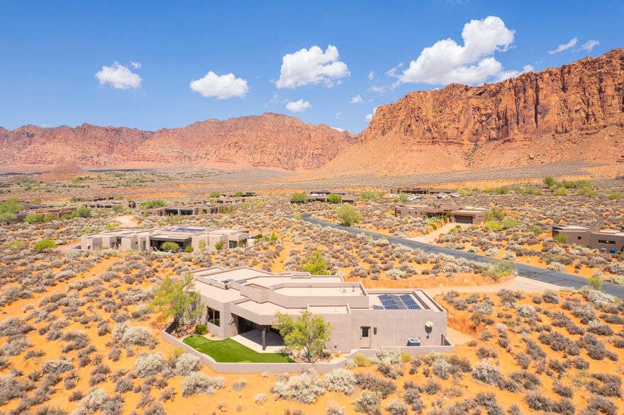 This gorgeous Kayenta home is located in the Taviawk area of Kayenta, and has the jaw dropping Red Mountain views that Kayenta is known for. The home sits on nearly one acre, and has been immaculately maintained. Stunning concrete floors throughout, with ample storage areas, 3 bedrooms and 2 bathrooms. Oversized 2-car garage, contemporary modern automatic blinds, solar panels and water softener are included. This quiet, secluded  home, with it's excellent views is a must see!