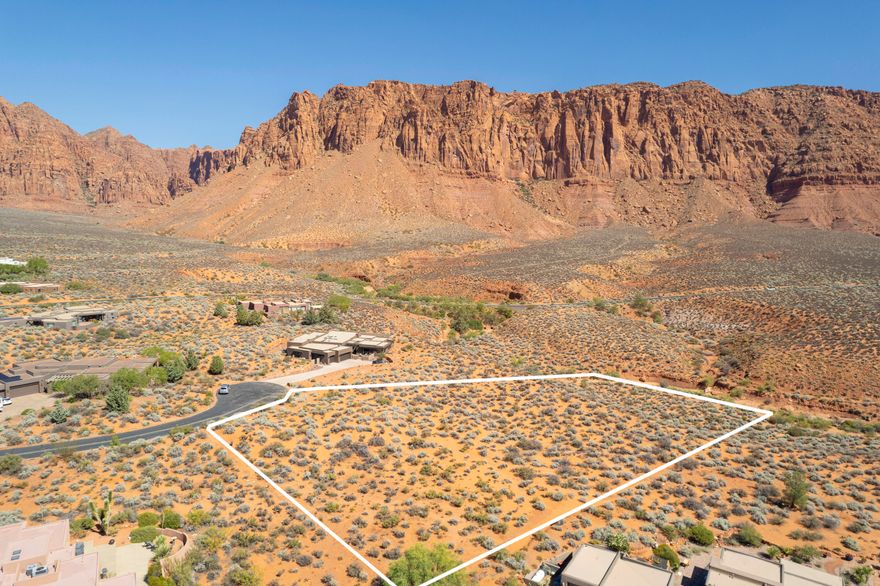 Don't miss the opportunity to own one of the largest and most and dramatic lots remaining in southern Utah's premiere desert community.  This prestigious and private 2.62 acre estate-sized lot is perched on the edge of the Kayenta Wash at the end of a secluded cut-de-sac and offers awe-inspiring and unobstructed views of towering red cliffs, expansive sagebrush and seasonal waterfalls.  Enjoy living in a ''national-park-like'' setting.  Stunning sunsets, protected night skies, and just 5 minutes to the cultural, gastronomic, and retail offerings of the renowned Kayenta Art Village.  Come see this amazing lot and envision yourself embracing and thriving in the Kayenta lifestyle.